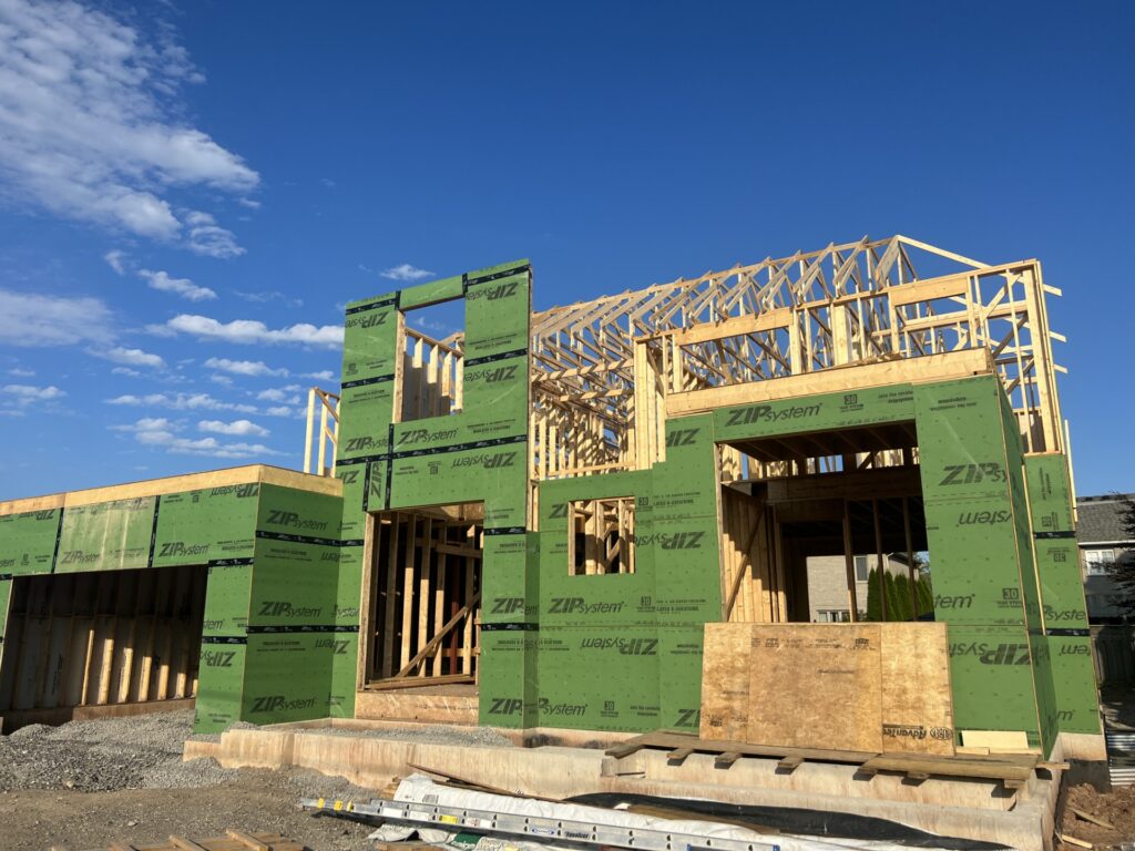 Large custom framed house in progress using zip system sheathing